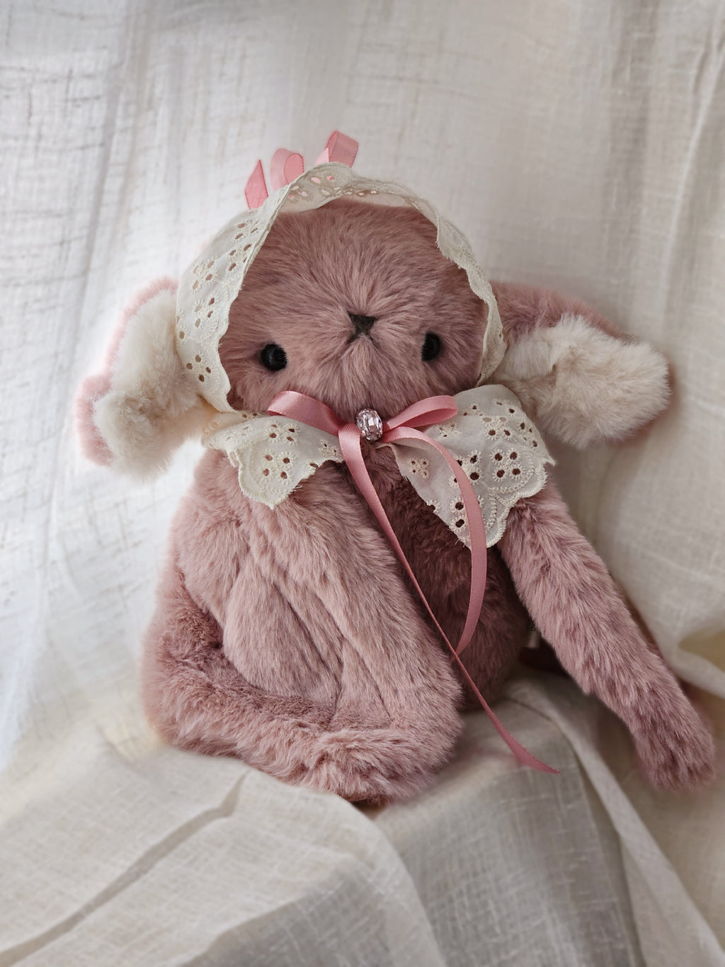 Pitidoll with ruffled ribbon and pink bow